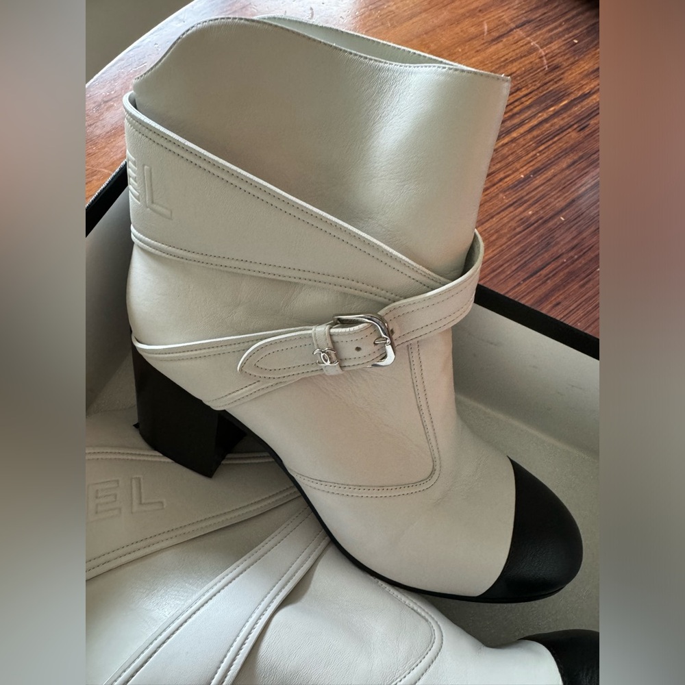 Black and white Chanel short boots